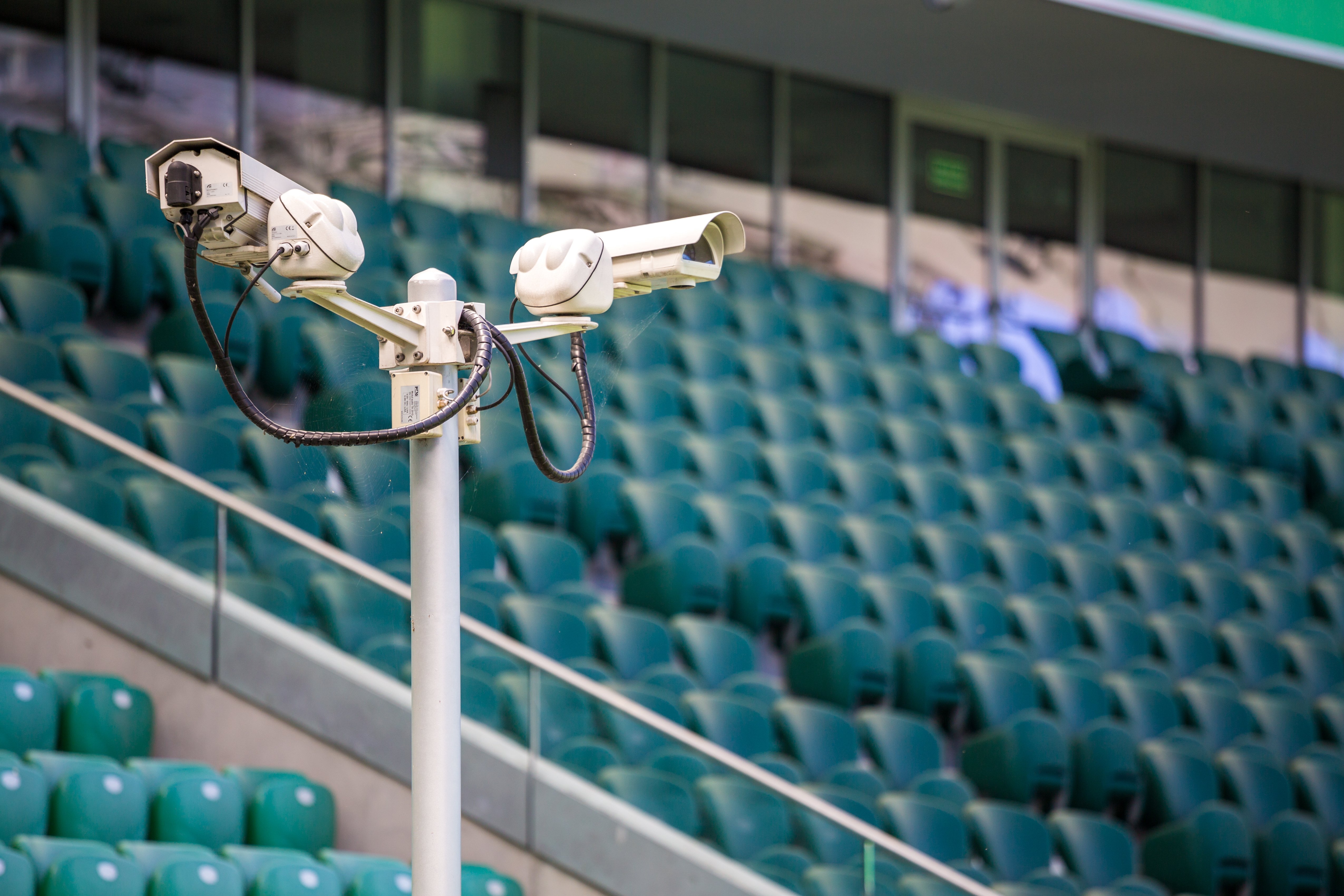 Surveillance cameras controlling a stadium.